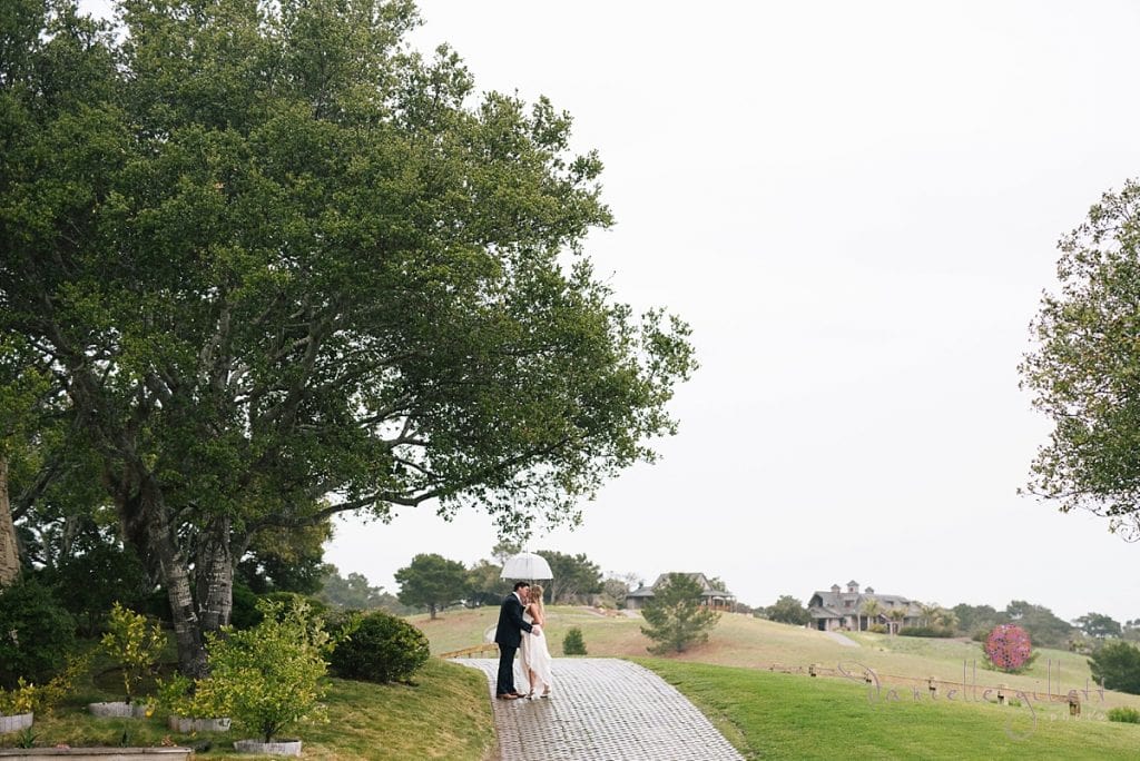 Bride and Groom walking down path at Tehama Golf Club