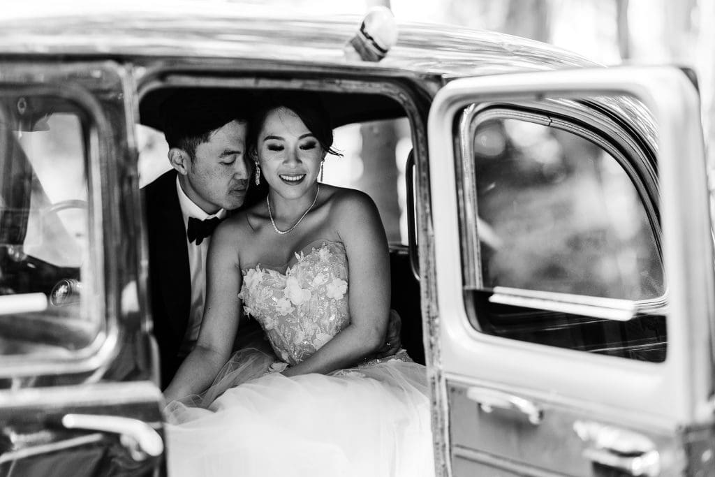 Nestldown Wedding photos. Bride and groom in the London Taxi